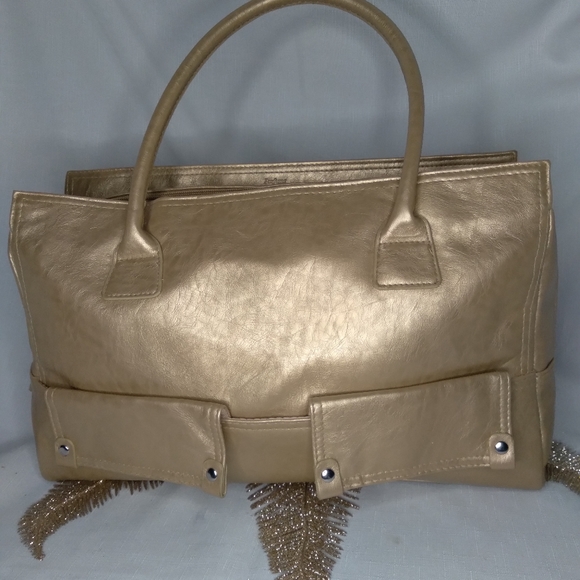 Nina Ricci Handbags - Gold Nina Ricci handbag